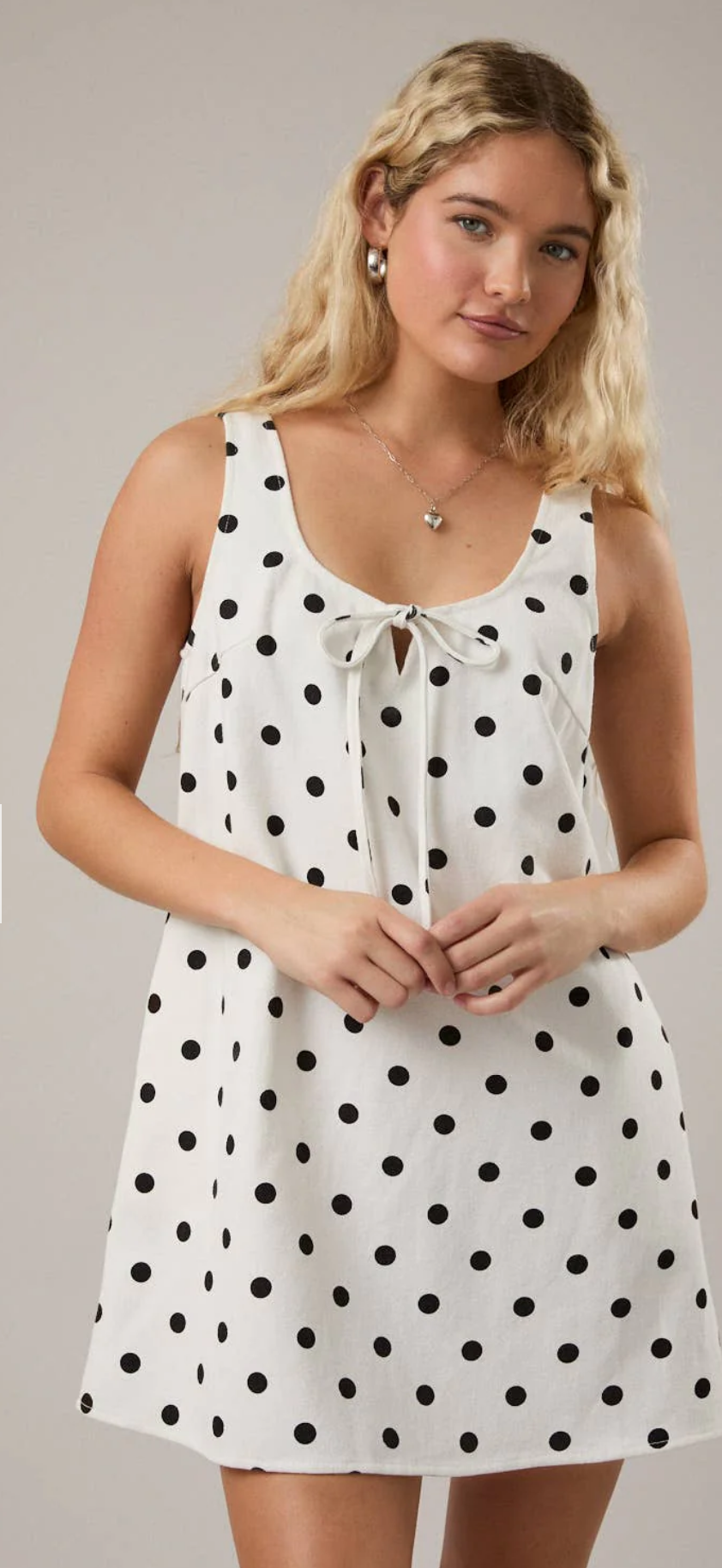 Sleeveless Scoop Neck Polka Dot
Denim Mini Dress