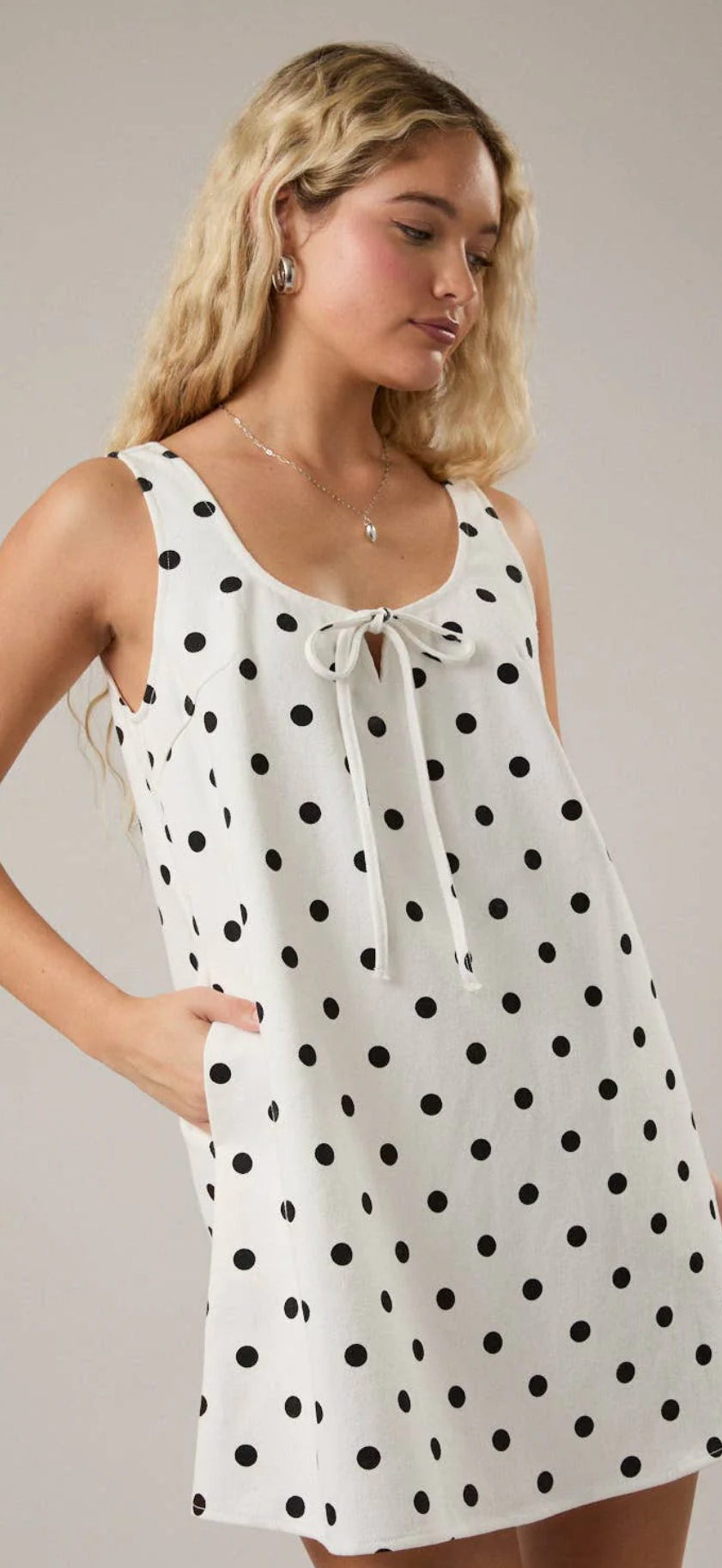 Sleeveless Scoop Neck Polka Dot
Denim Mini Dress